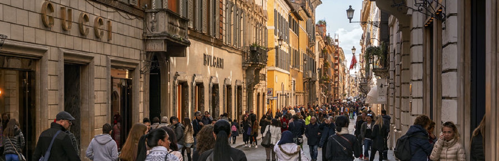 Rome, italy, february 2017: people walking along the elegant shopping avenue Via di Condotti in Rome, Italy